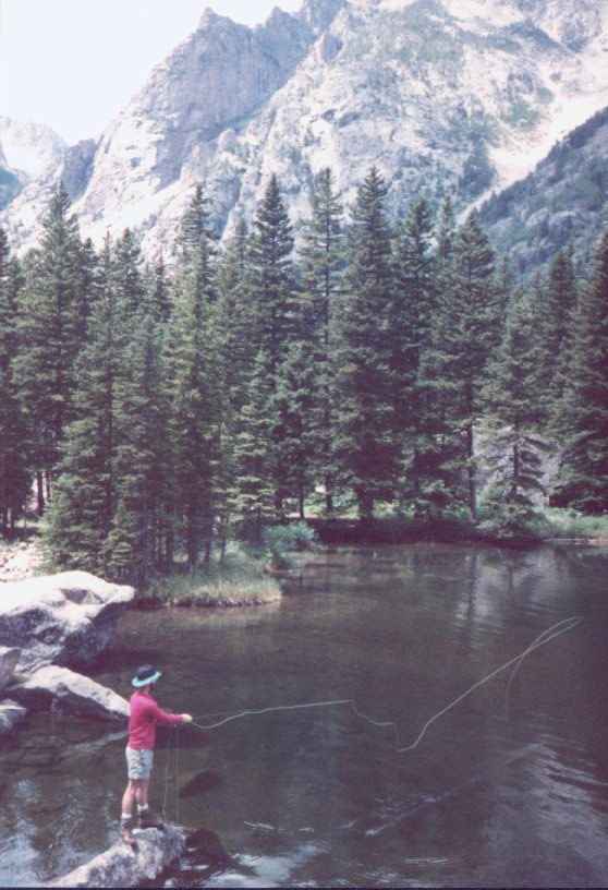 Backpacking in Montana; Ricky fishing for Cutthroat Trout at 11,000 feet